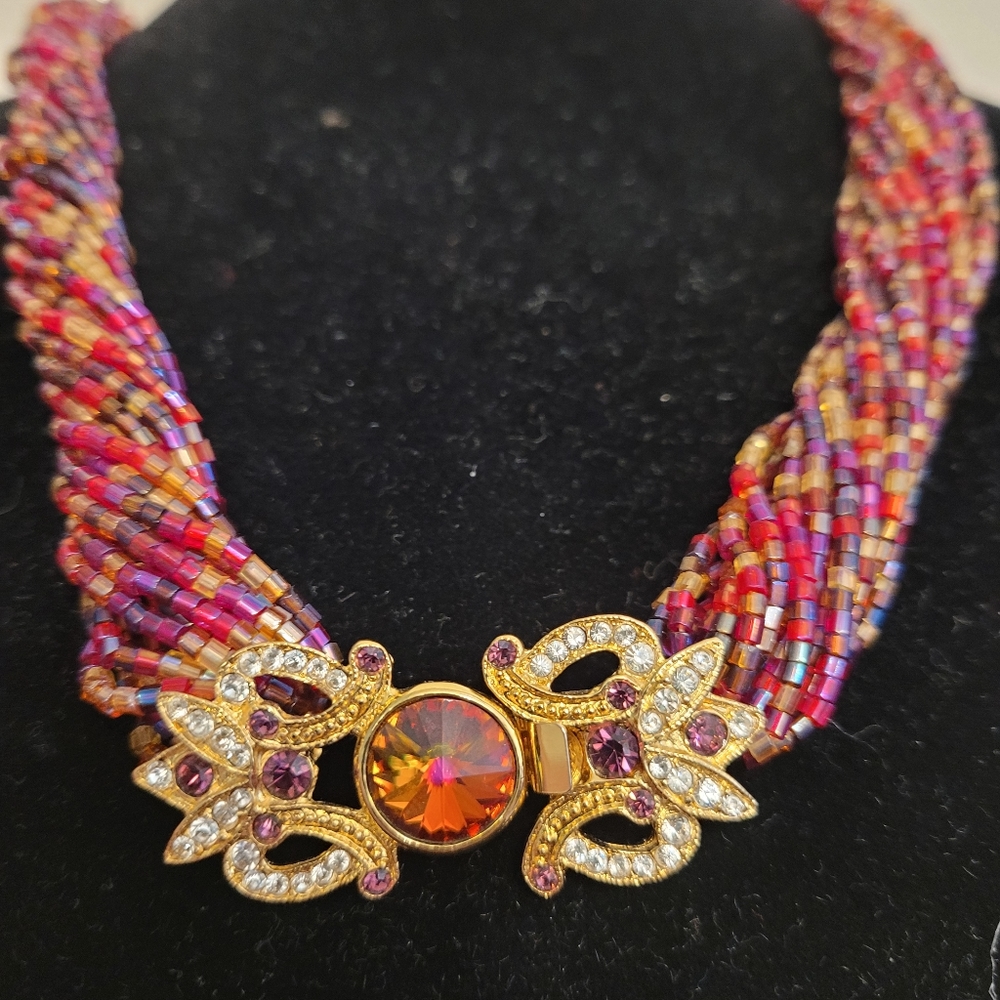 Beaded necklace with gold broach